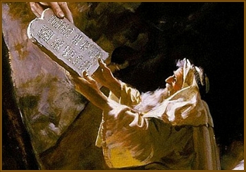 The CREATOR hands Moses the two tablets.