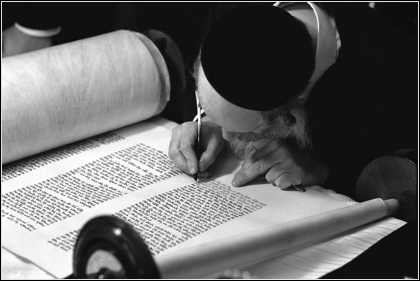 Scribe recording the Torah.